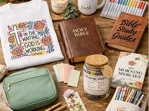 Faith-inspired gifts for Bible study: journal, Bible, shirt, pens and verse cards on a wooden table